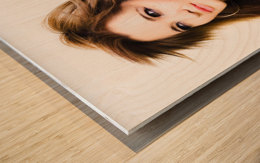 Female fashion model with wind blown hair Wood print