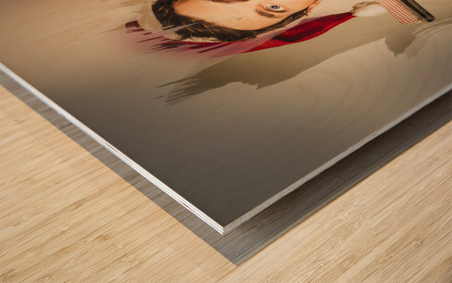 Santa elf preparing for Christmas Wood print