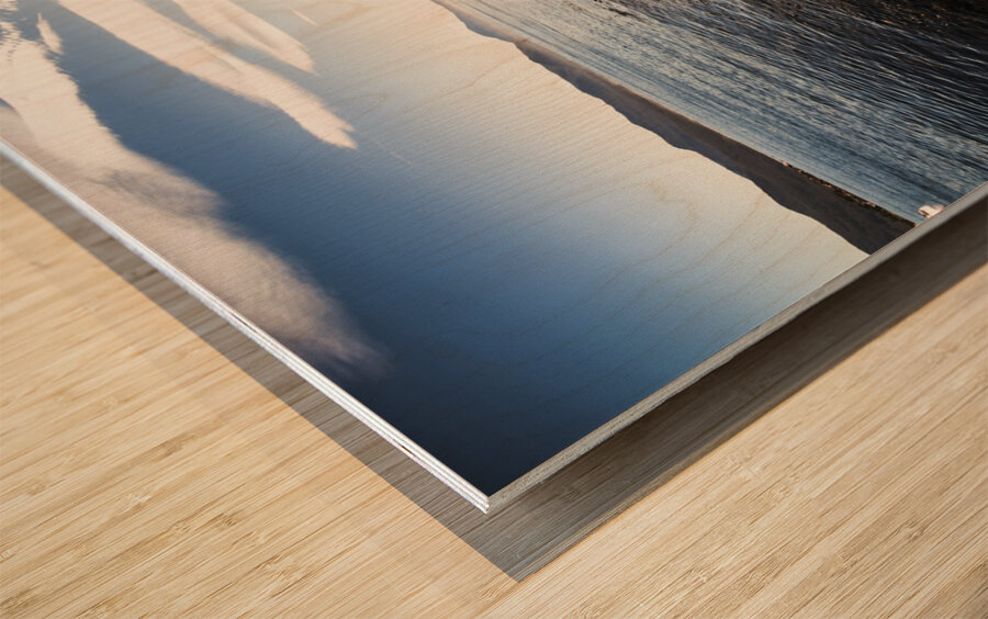 Beautiful rock covered coastline Wood print