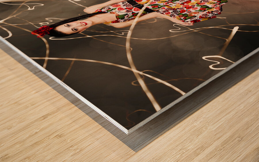 Woman dancing in colorful floral dress outdoor Wood print