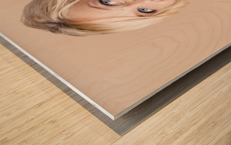 Gorgeous blond woman laughing on telephone call Wood print