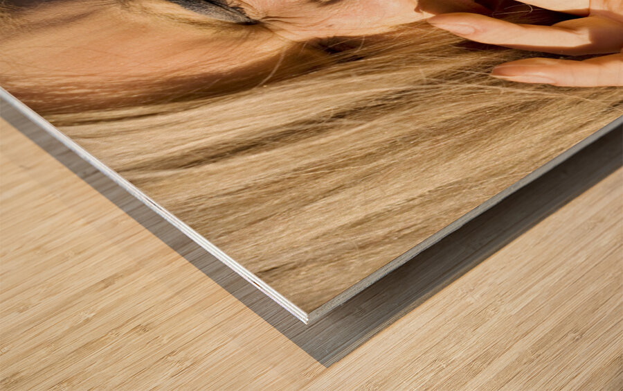 Woman Blowing Party Horns Wood print