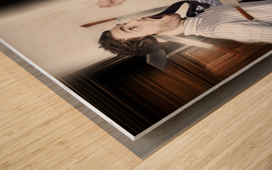 Crazy businessman running in fear from danger Wood print