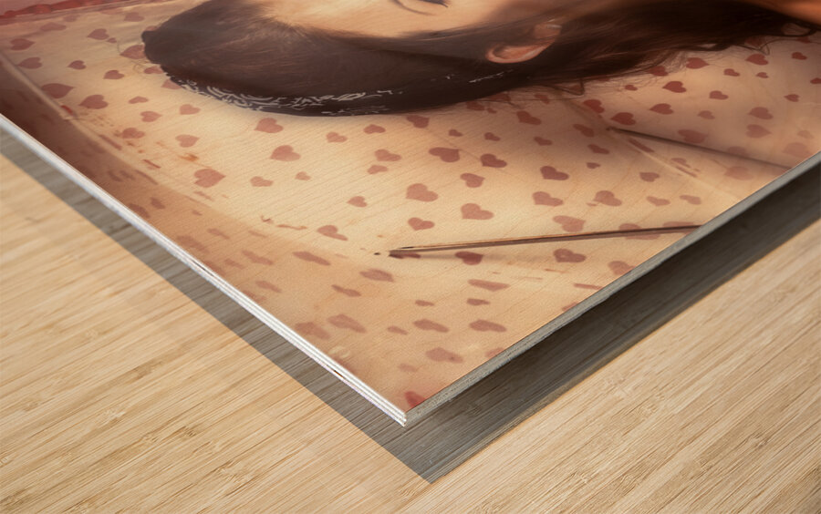 Beautiful woman catching rain in summer sun shower Wood print