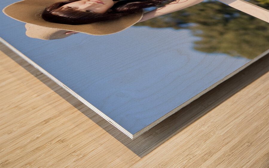 Portrait Of A Smiling Woman Resting On A Pier Bench Wood print