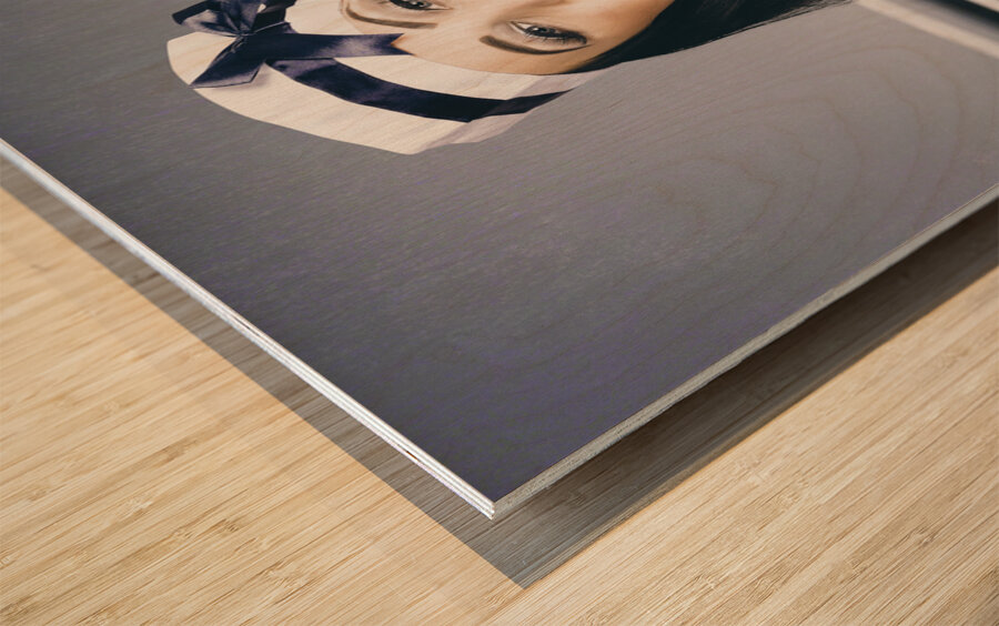 Young vintage sailor girl looking out to sea Wood print