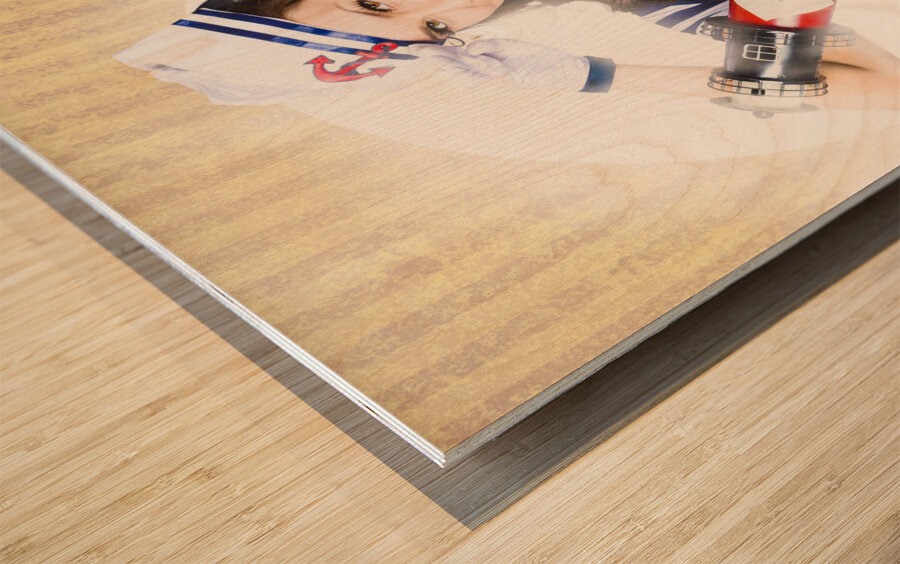 Pinup portrait of young happy naval woman Wood print