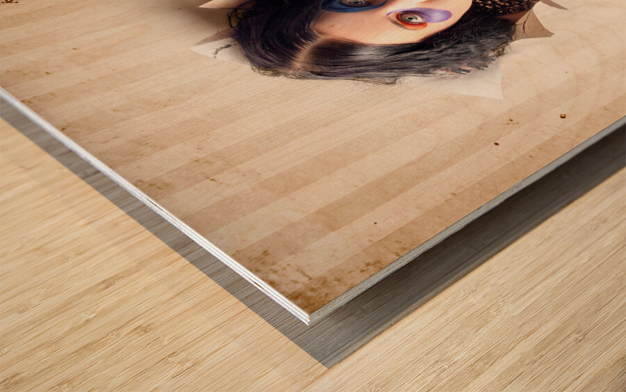 Beautiful female jester breaking out of wallpaper Wood print