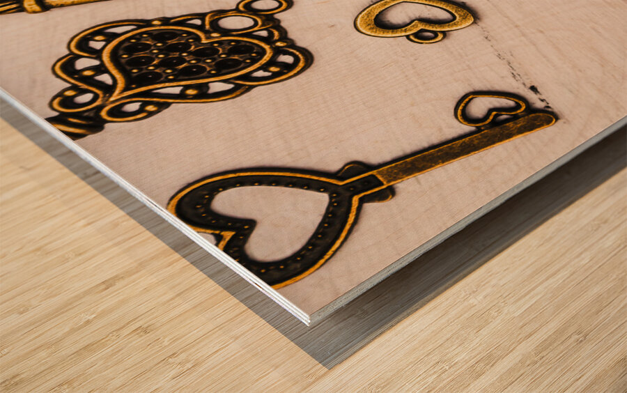 Metal keys of different size on wooden table Wood print