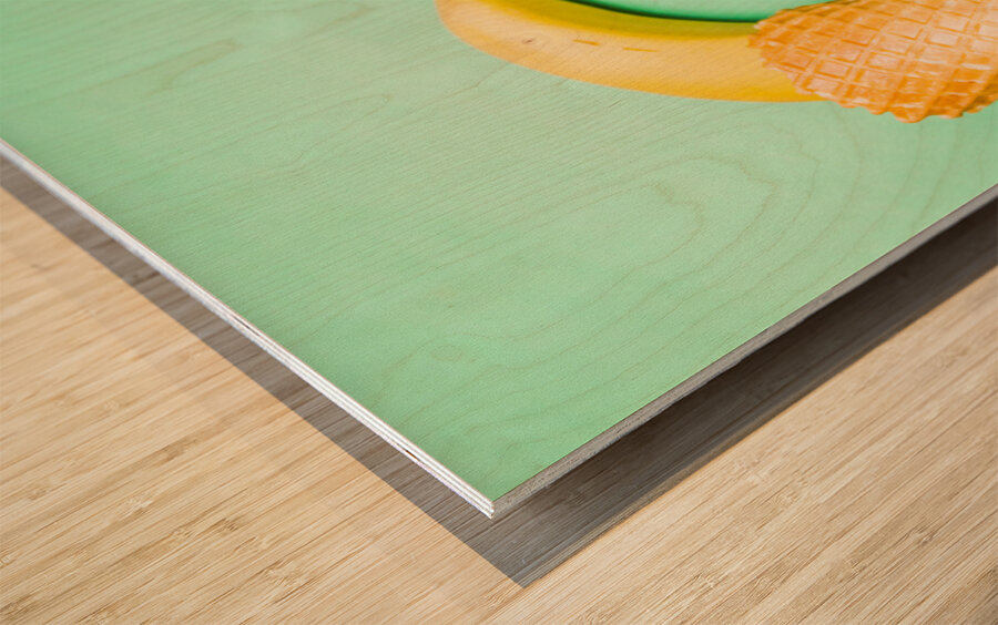 Whole bannana and slices placed in ice cream cone Wood print