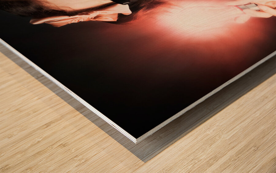 Smart Business Person Holding Light Bulb In Hand Wood print