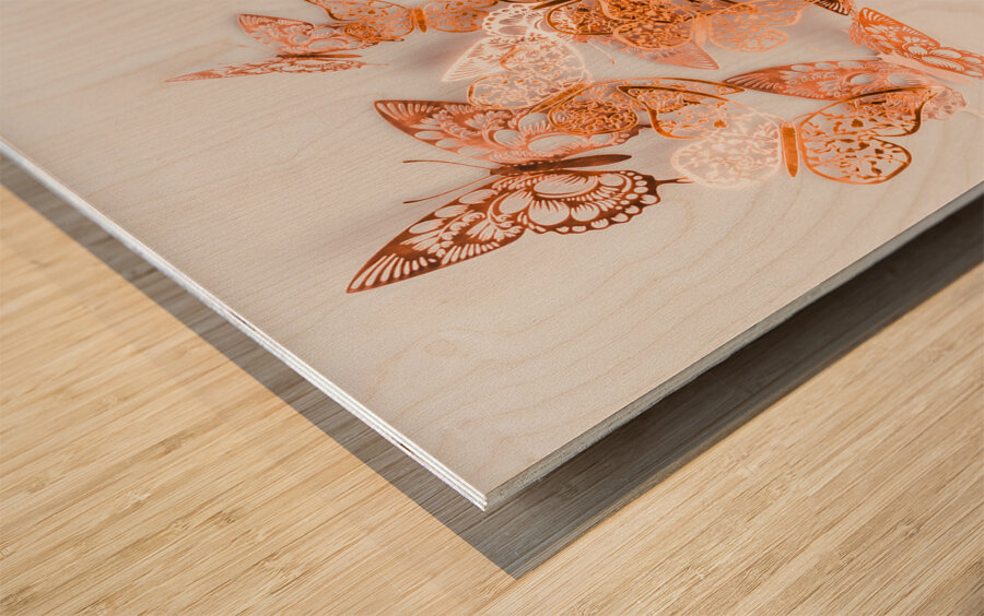 A flurry of peach and gold butterflies Wood print