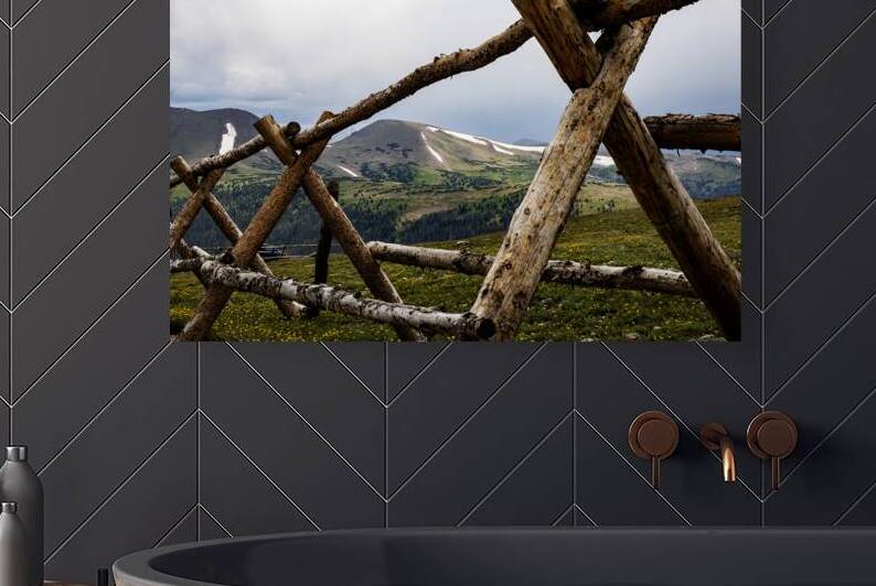 Wooden Fence Framing a Snowy Rocky Mountain Lands by Woodys Photos