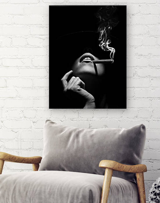 Woman smoking a cigar by Johan Swanepoel