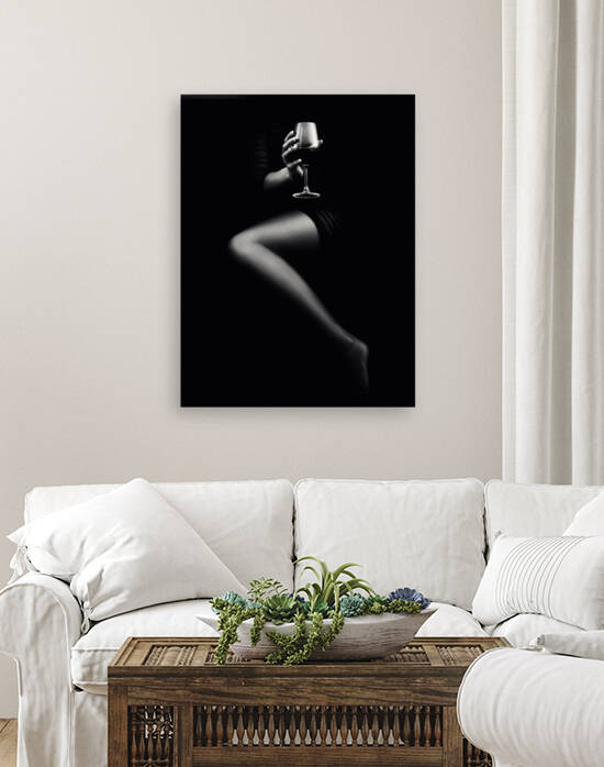 Woman holding red wine by Johan Swanepoel