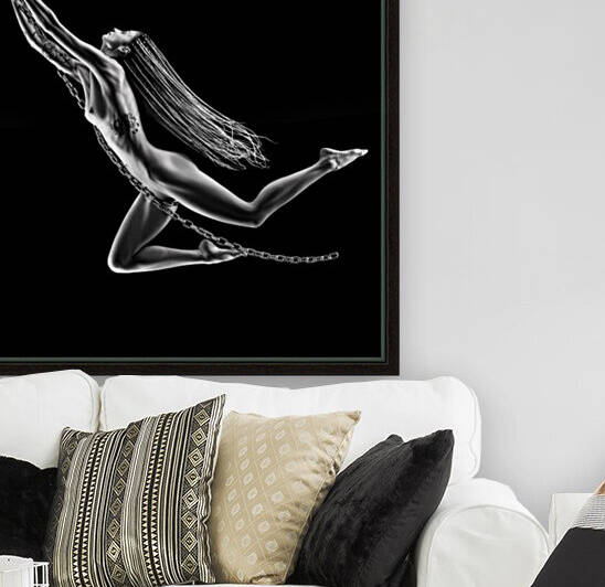 Nude woman swinging on chains by Johan Swanepoel