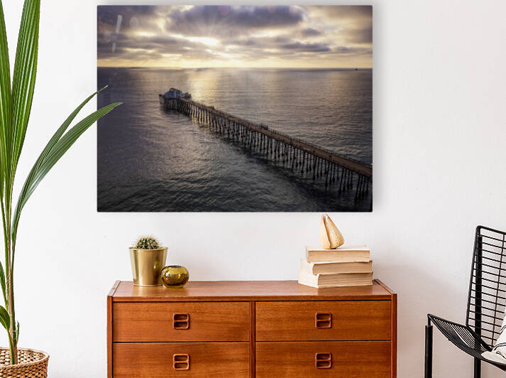 Cloudy sunset at the pier Reproduction