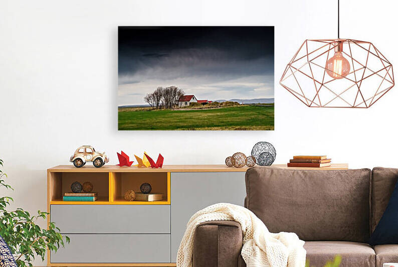 Icelandic Cottage house under the ominous dark clouds by Jason Wen Bin TONG 