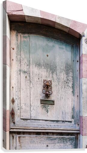 Ancient Door with rusty knocker Canvas Print