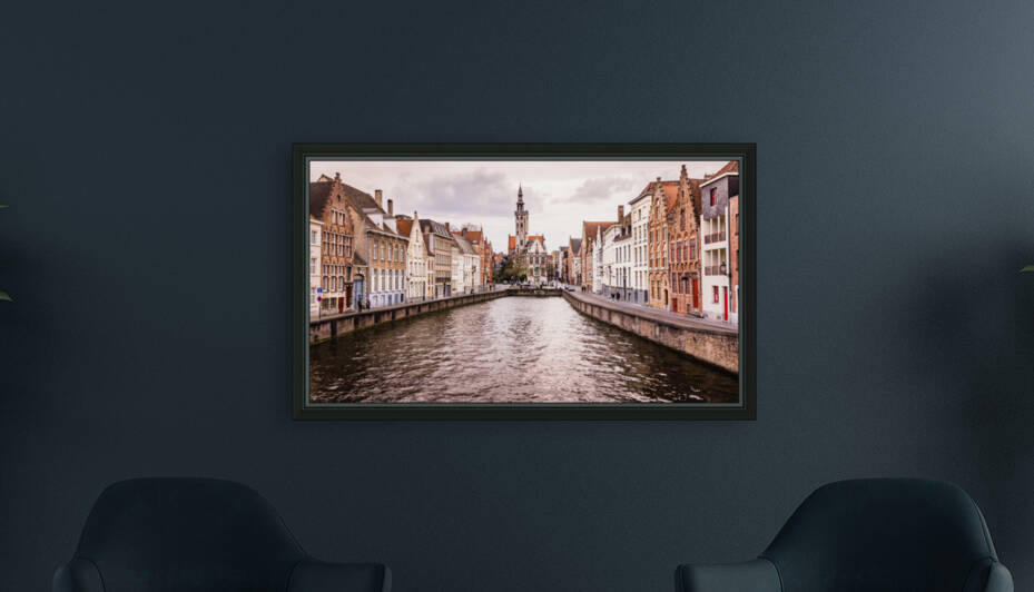 Bruges Canal with the Poortersloge by bj clayden photography
