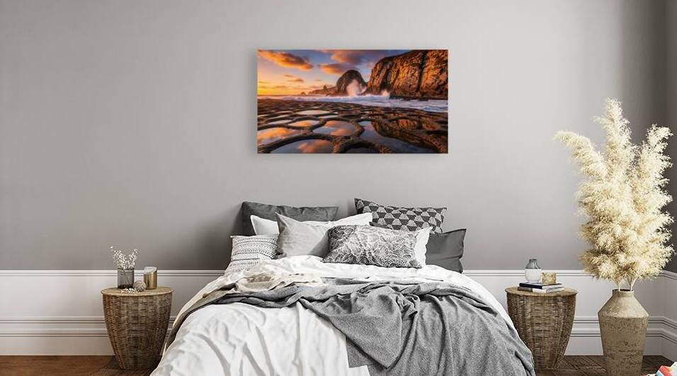 Dramatic Coastal Cliffs at Golden Hour with Reflective Tide Pools by Oussama Wail Bouhentala