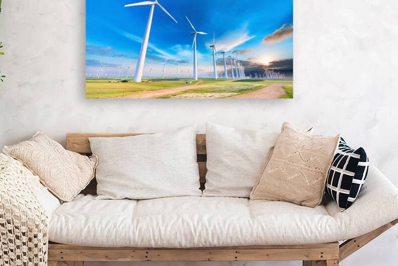 A vast landscape dominated by a series of wind tu by Mirela Poiana