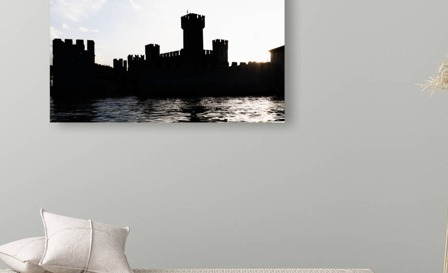 Italy - Sirmone castle silhouette on the Garda lake at sunset. M by Paolo Modena