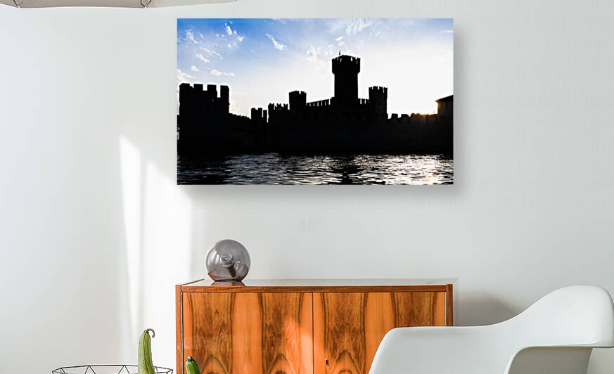 Italy - Sirmone castle silhouette on the Garda lake at sunset. M by Paolo Modena