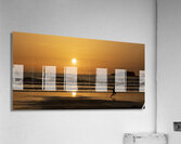 Man running along the beach at sunset  Acrylic Print