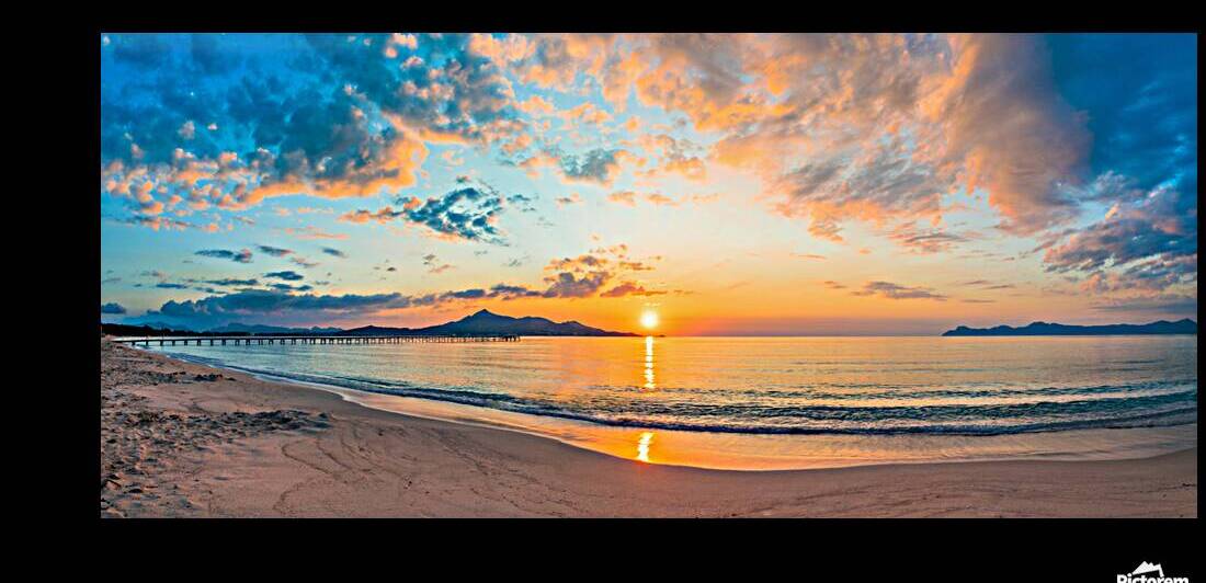 Idyllic view of romantic sunrise at morning on the beach by alex