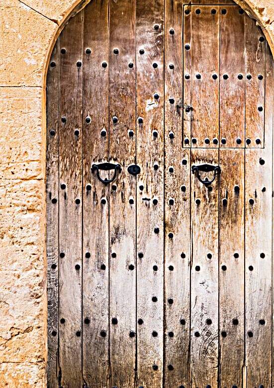 Close-up of old weathered wooden front door by alex