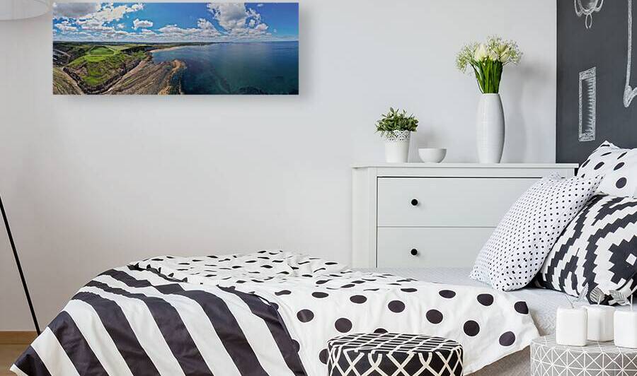 Aerial view of coastal cliffs and calm sea at Cayton Bay Yorkshire by Vasile Jechiu