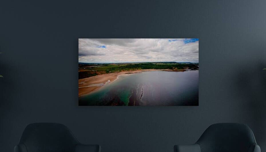 Aerial view of a serene coastal landscape at Cayton Bay Yorkshire by Vasile Jechiu