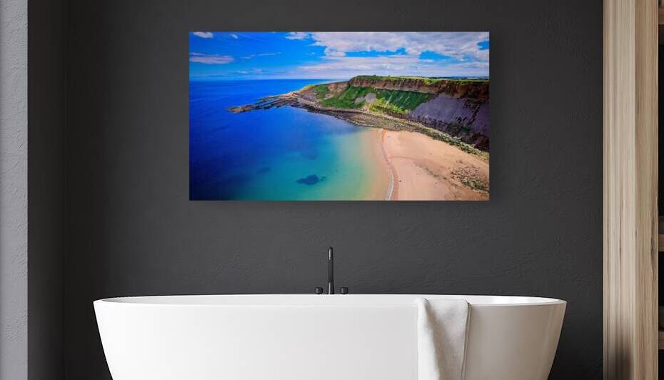 Scenic coastal landscape with beach and cliffs at Cayton Bay Yorkshire by Vasile Jechiu