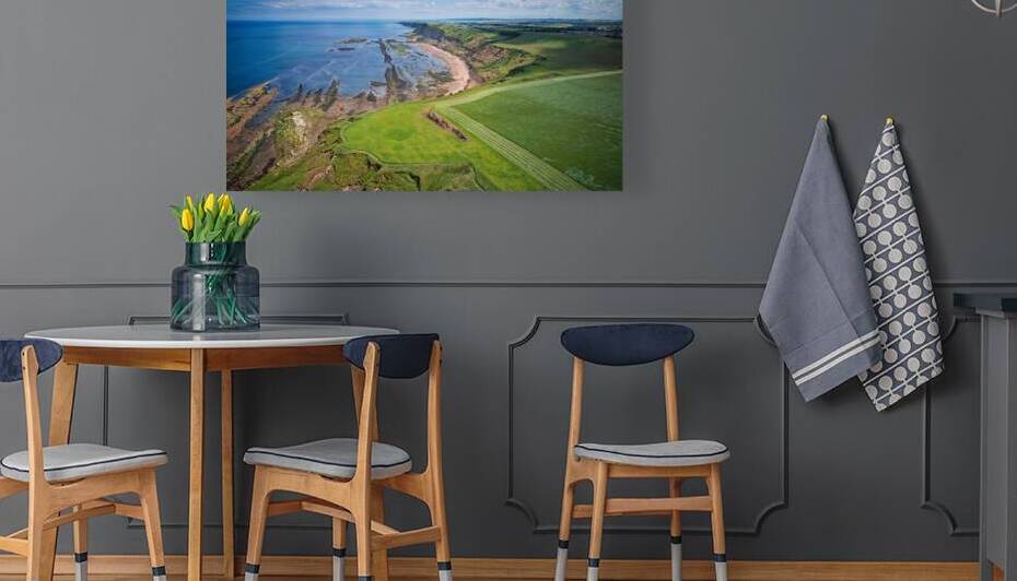 Aerial view of coastal cliffs and sandy beach at Cayton Bay Yorkshire by Vasile Jechiu