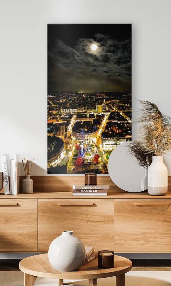Cityscape at night with illuminated streets under a full moon in Harrogate North Yorkshire. by Vasile Jechiu