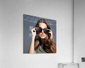 Woman with Eyes Looking Through Dark Sunglasses Acrylic Print
