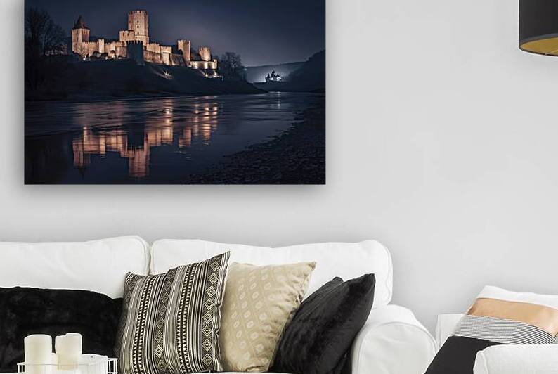 A breathtaking nighttime view of an ancient castl by Aurel Dobre