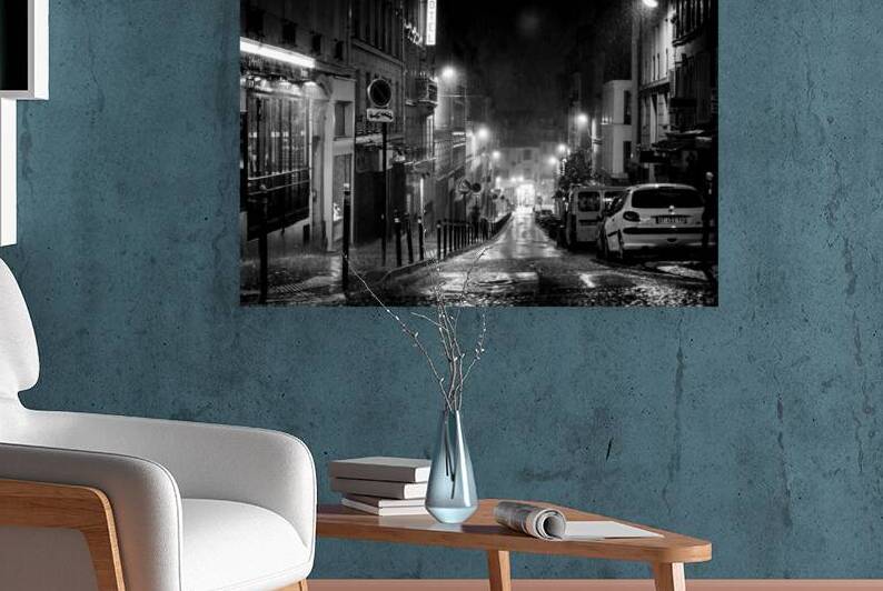 rue abbesses in pouring rain at night  horizontal by Black And White