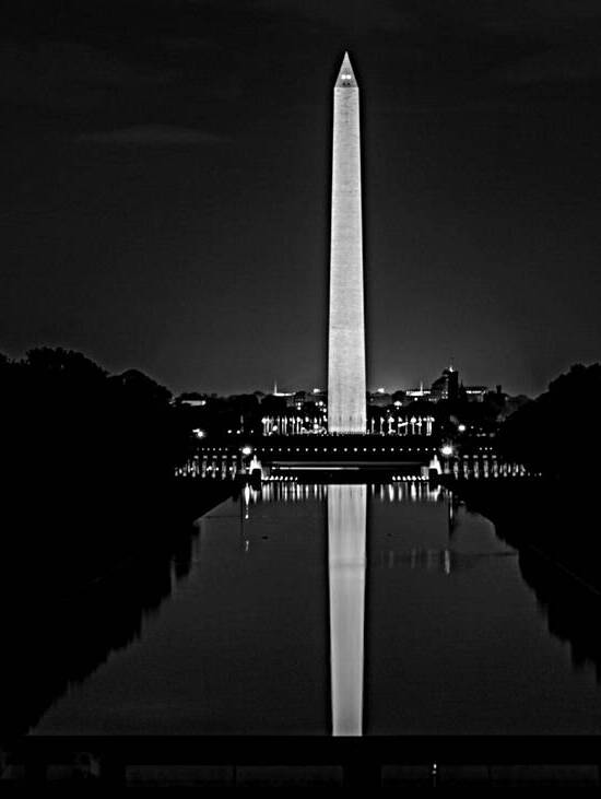 washington monument at night from lincoln memoria by Black And White