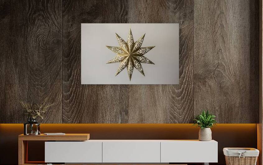 A stunning golden star ornament by Gabriela Ghita