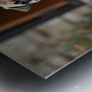 Tan and black Pug puppy with a wrinkled face sits proudly on a stone patio Metal print