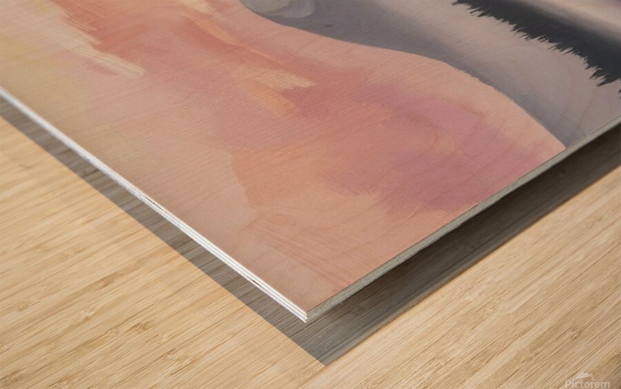 A misty mountain range and a tranquil lake at sunrise Wood print